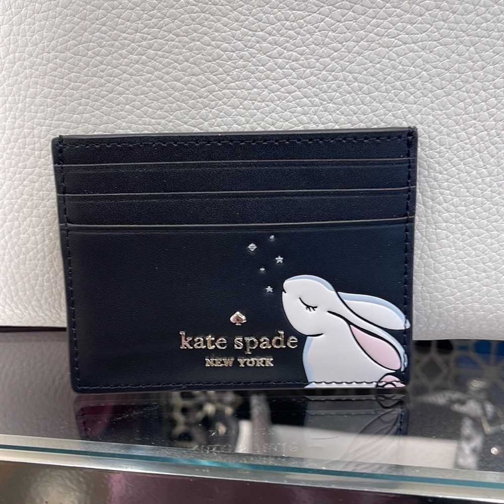 Kate Spade Bunbun Bunny Small Slim Card Holder Wallet

COLOR:
Black Multi
NWT - Picture 14 of 16
